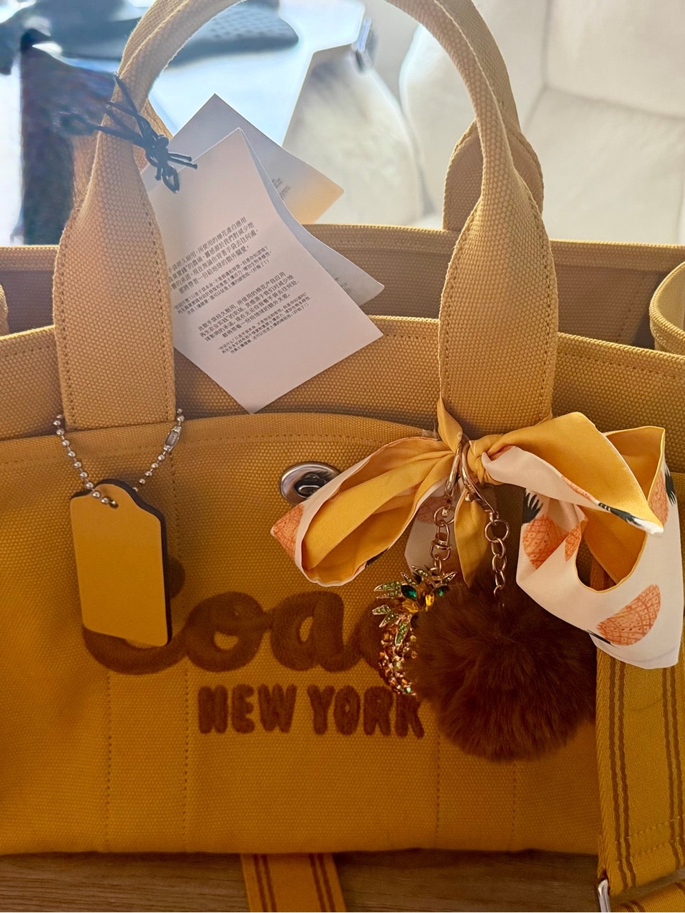 Coach Yellow Cargo Canvas Tote with Pom Charm and Scarf Accent